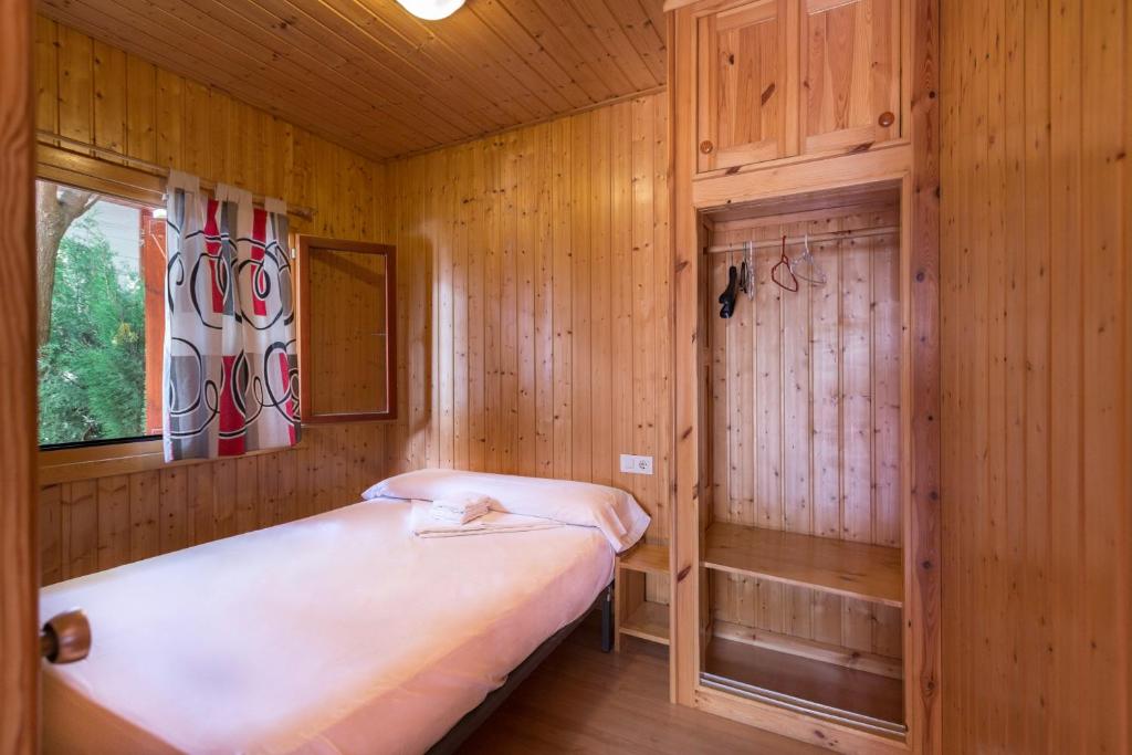 Posteľ alebo postele v izbe v ubytovaní Camping Los Llanos