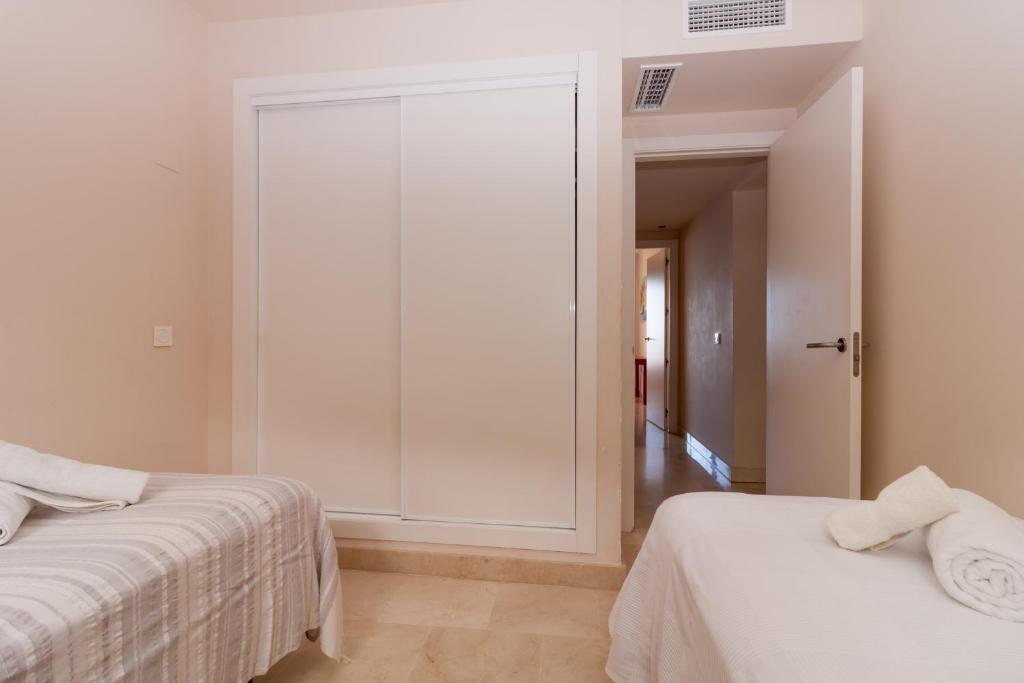 A bed or beds in a room at Carlota Calaceite Paradise