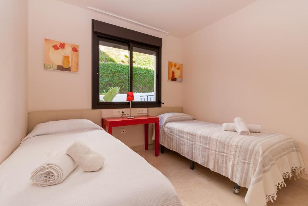 A bed or beds in a room at Carlota Calaceite Paradise