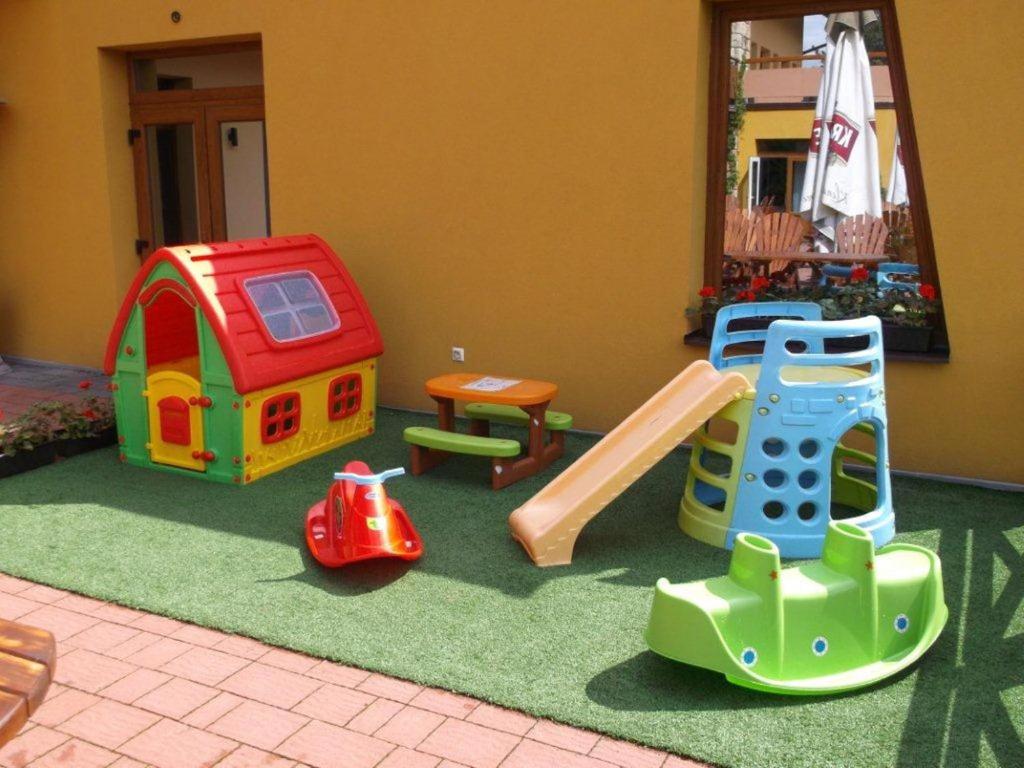 a room with play equipment on the floor at Holiday Park Orava - Hotel Orava in Dolný Kubín