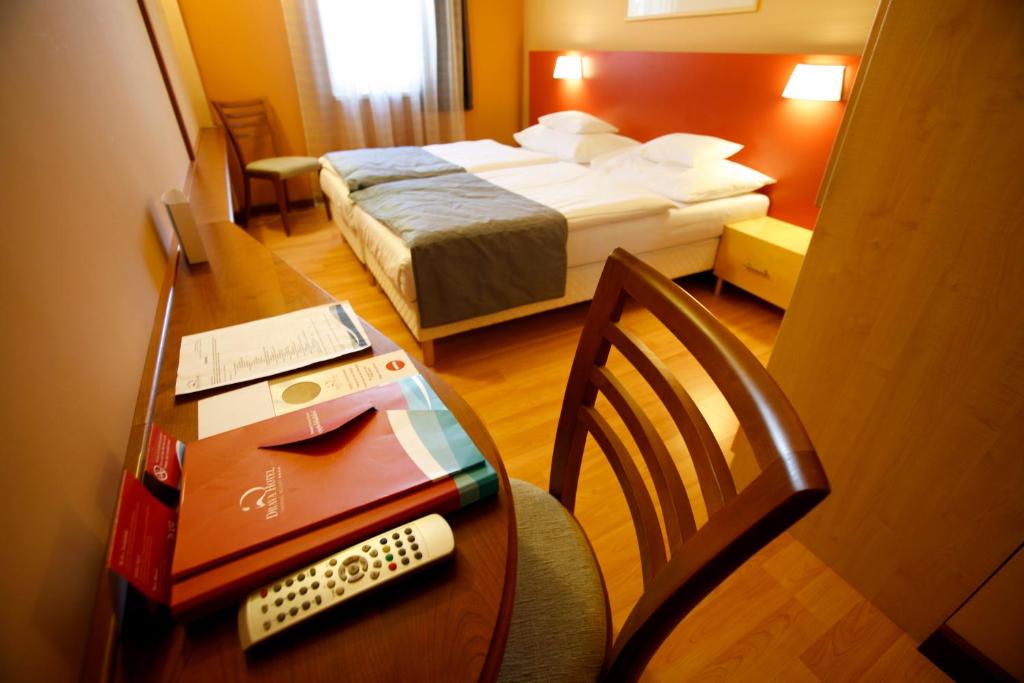 Postel nebo postele na pokoji v ubytování Dráva Hotel Thermal Resort