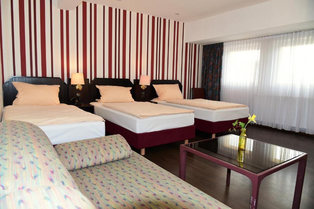 Hotel Harsshof - Dreibettzimmer