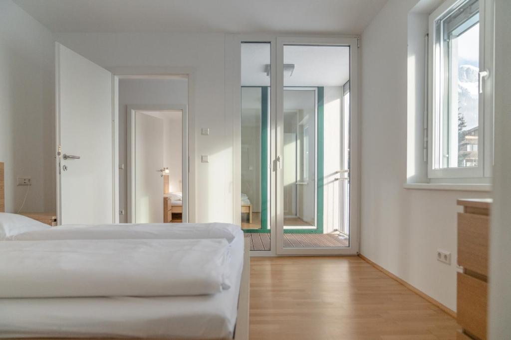 Posteľ alebo postele v izbe v ubytovaní Appartements Ramsau am Dachstein by Schladmingurlaub
