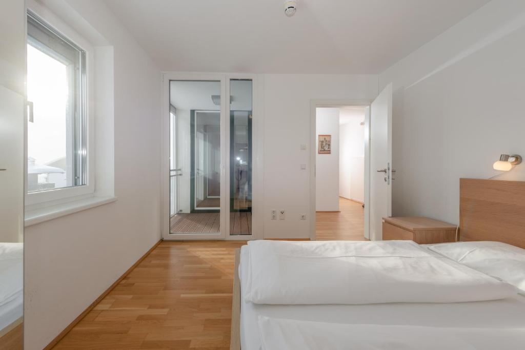 Posteľ alebo postele v izbe v ubytovaní Appartements Ramsau am Dachstein by Schladmingurlaub