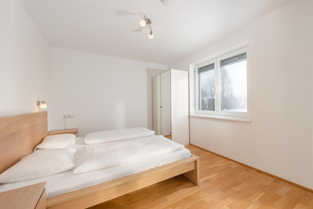 Posteľ alebo postele v izbe v ubytovaní Appartements Ramsau am Dachstein by Schladmingurlaub