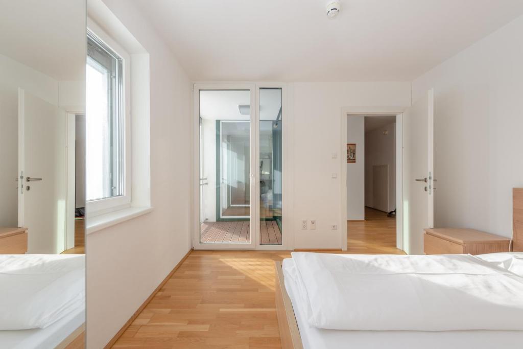 Posteľ alebo postele v izbe v ubytovaní Appartements Ramsau am Dachstein by Schladmingurlaub