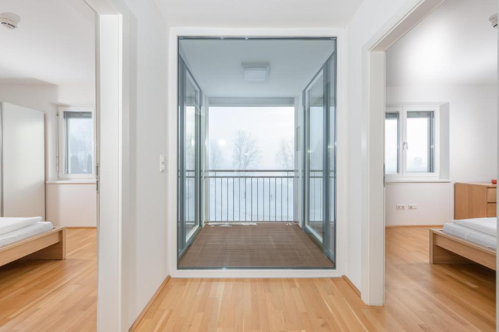 Posteľ alebo postele v izbe v ubytovaní Appartements Ramsau am Dachstein by Schladmingurlaub