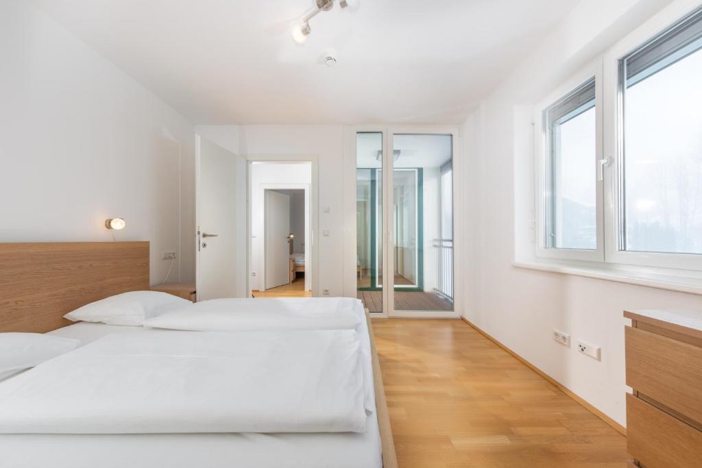 Posteľ alebo postele v izbe v ubytovaní Appartements Ramsau am Dachstein by Schladmingurlaub