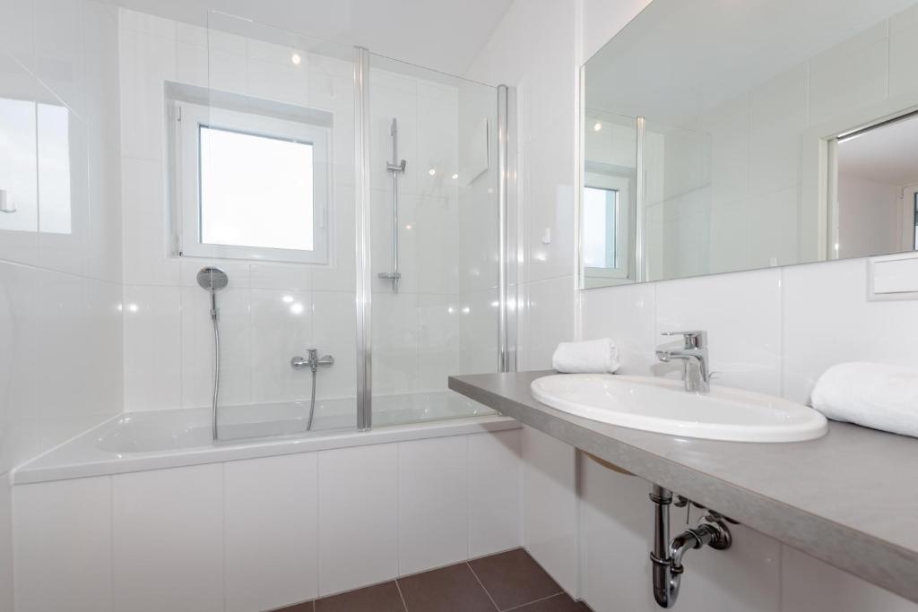 Kúpeľňa v ubytovaní Appartements Ramsau am Dachstein by Schladmingurlaub