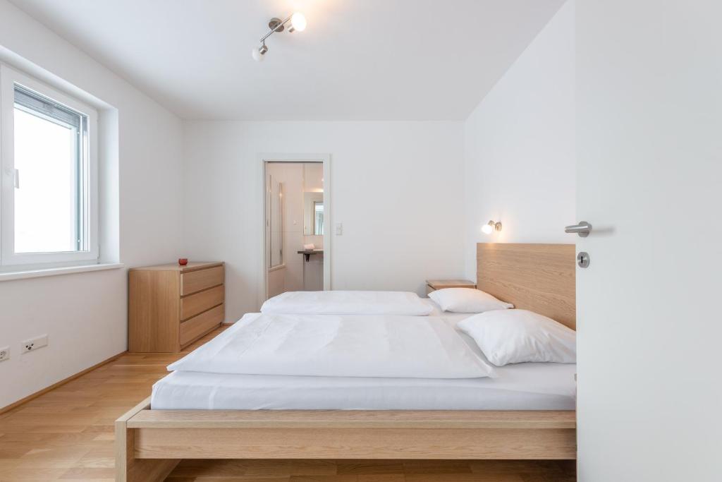 Posteľ alebo postele v izbe v ubytovaní Appartements Ramsau am Dachstein by Schladmingurlaub