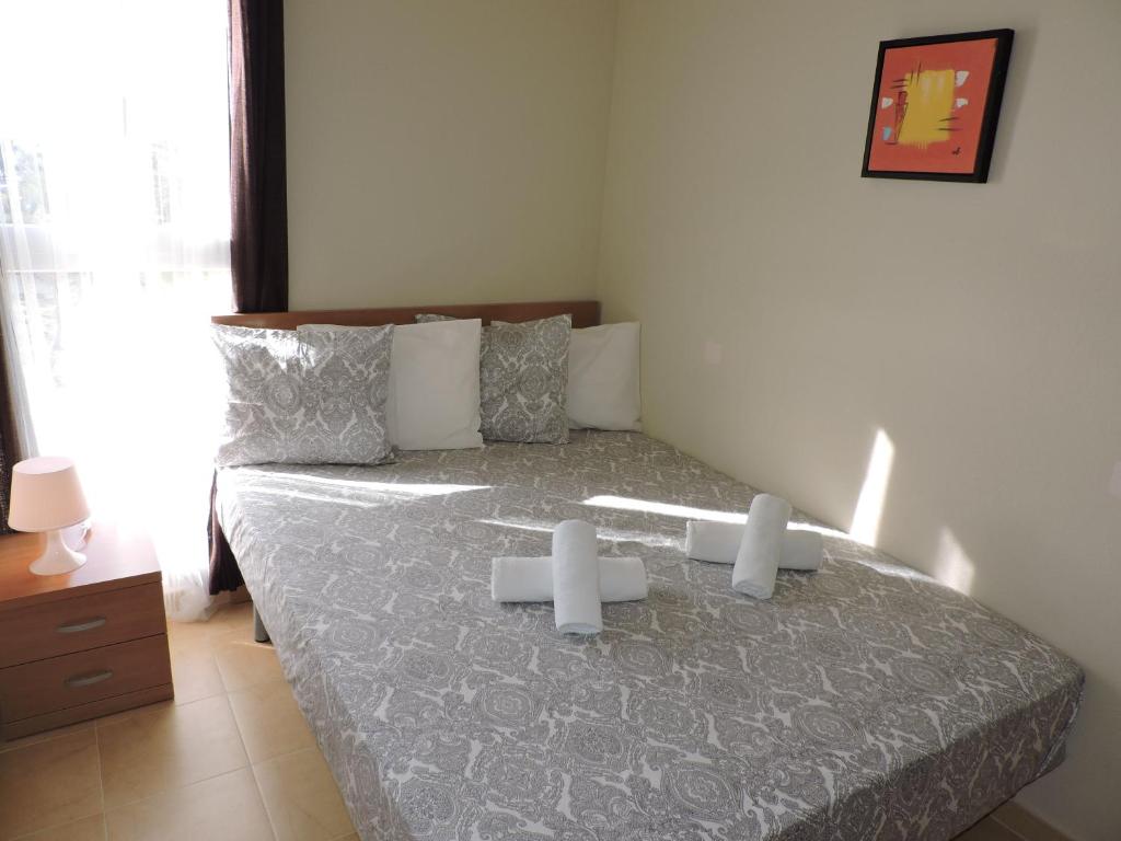 A bed or beds in a room at La Manga Apartments - Punta Cormoran