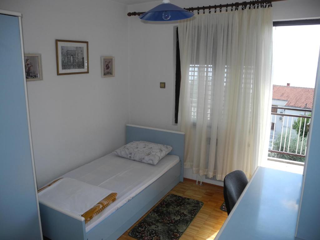 Posteľ alebo postele v izbe v ubytovaní Apartment BLANKA 4+1