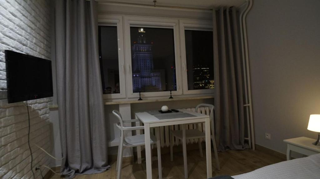 Televízia a/alebo spoločenská miestnosť v ubytovaní Bagno 154 City centre