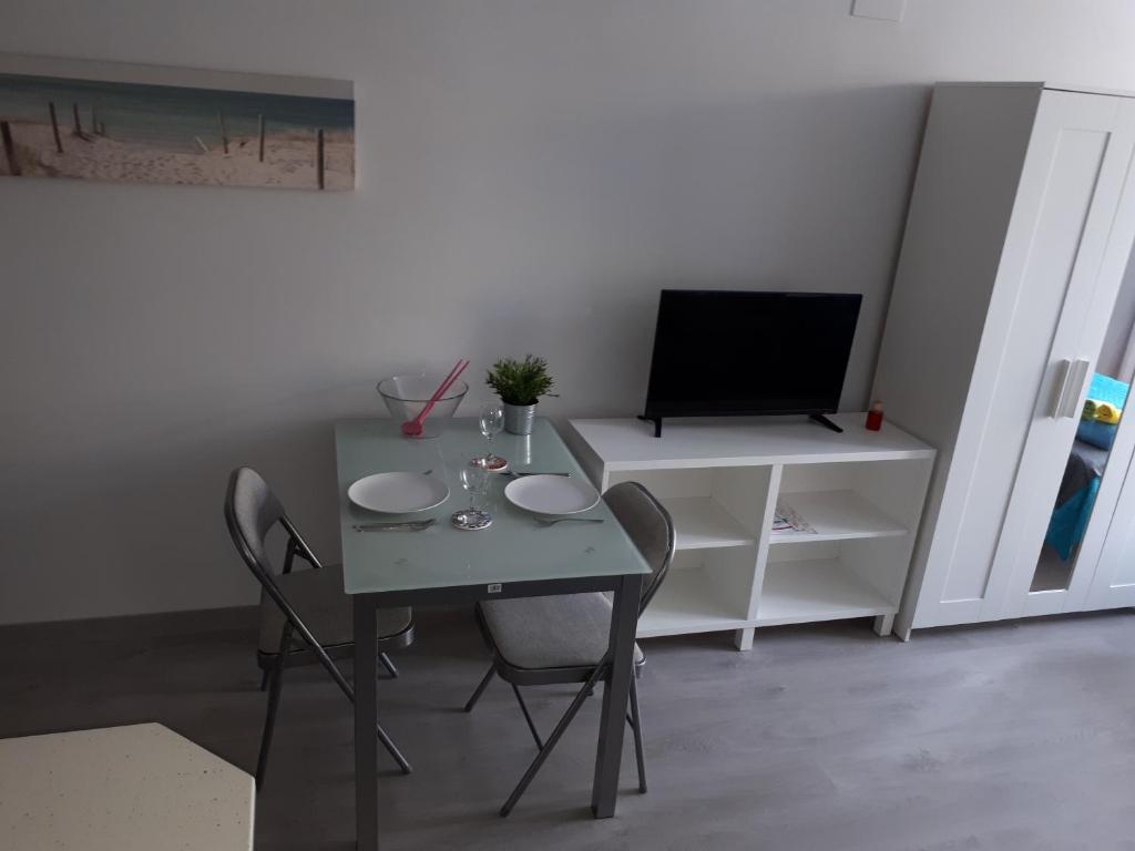 TV a/nebo společenská místnost v ubytování Calle Antonio Millón