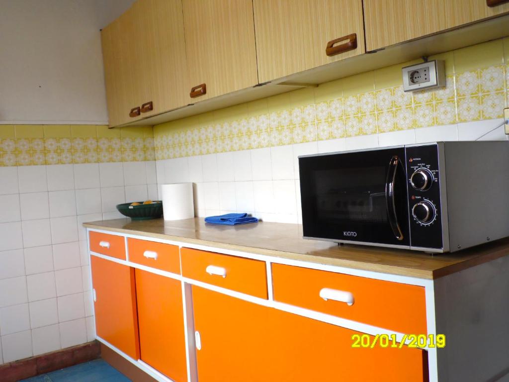 Kuchyň nebo kuchyňský kout v ubytování Habitaciones Mar Azul