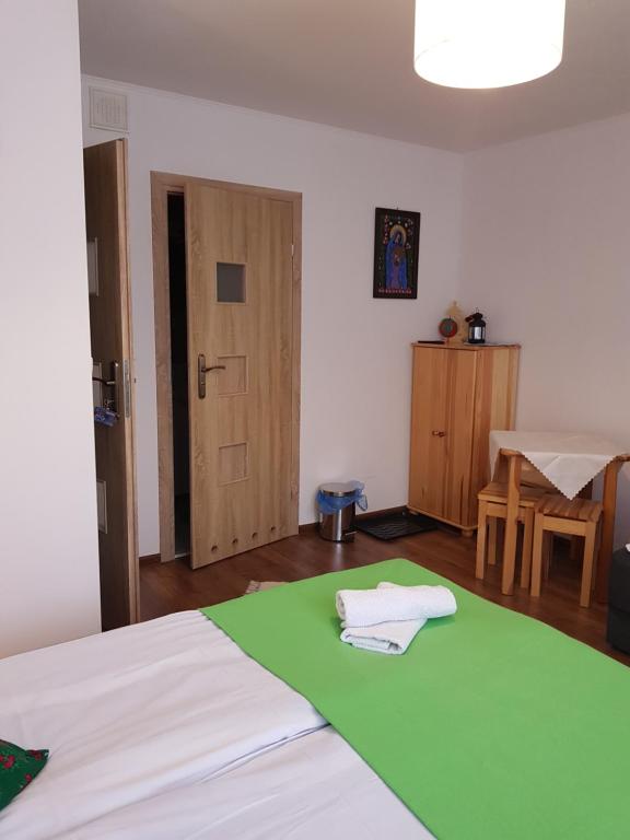 Postel nebo postele na pokoji v ubytování Pokoje u Agi