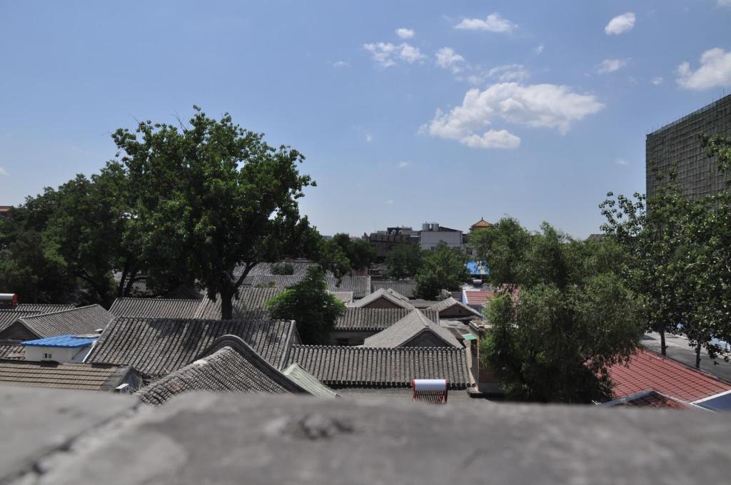 北京Chinese Culture Boutique Hotel-Tangfu,Traditional Chinese Theme,Heart of Beijing,Near Forbidden City,Tiananmen Square,Hutongs,Metro Access,Free Coffee,tea,Laundry的享有带屋顶和树木的城市美景