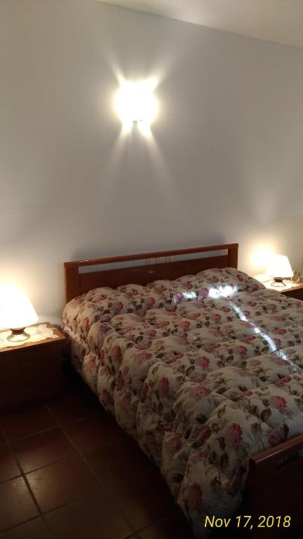 A bed or beds in a room at Casa a Soliera