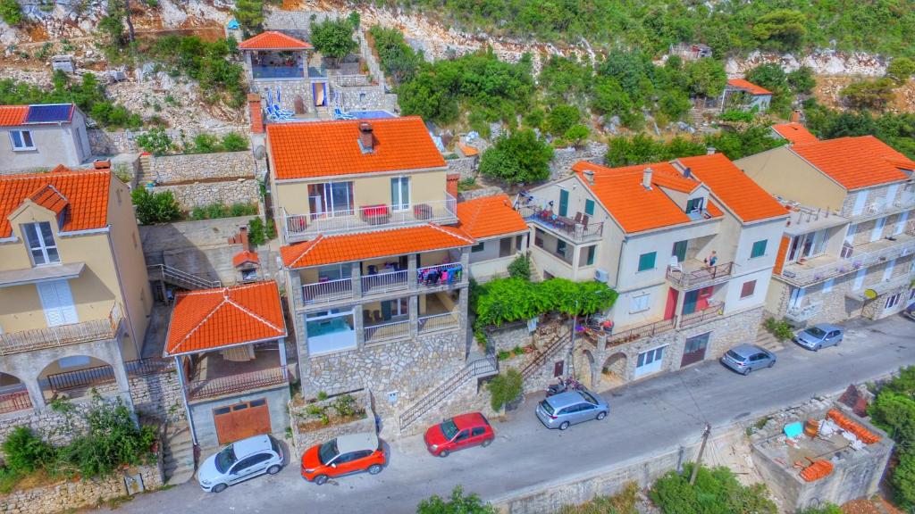 an aerial view of houses with orange roofs at Adriatic - Apartment with jacuzzi in Sobra