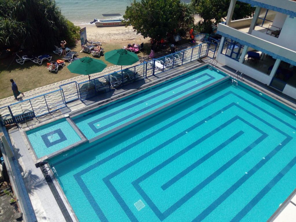 Bazén v ubytování Paradise Beach Resort & Diving school nebo v jeho okolí