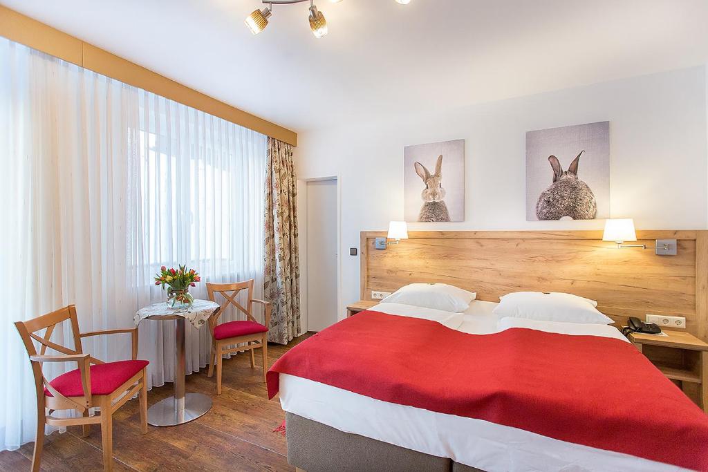Postel nebo postele na pokoji v ubytování Hotel Diana