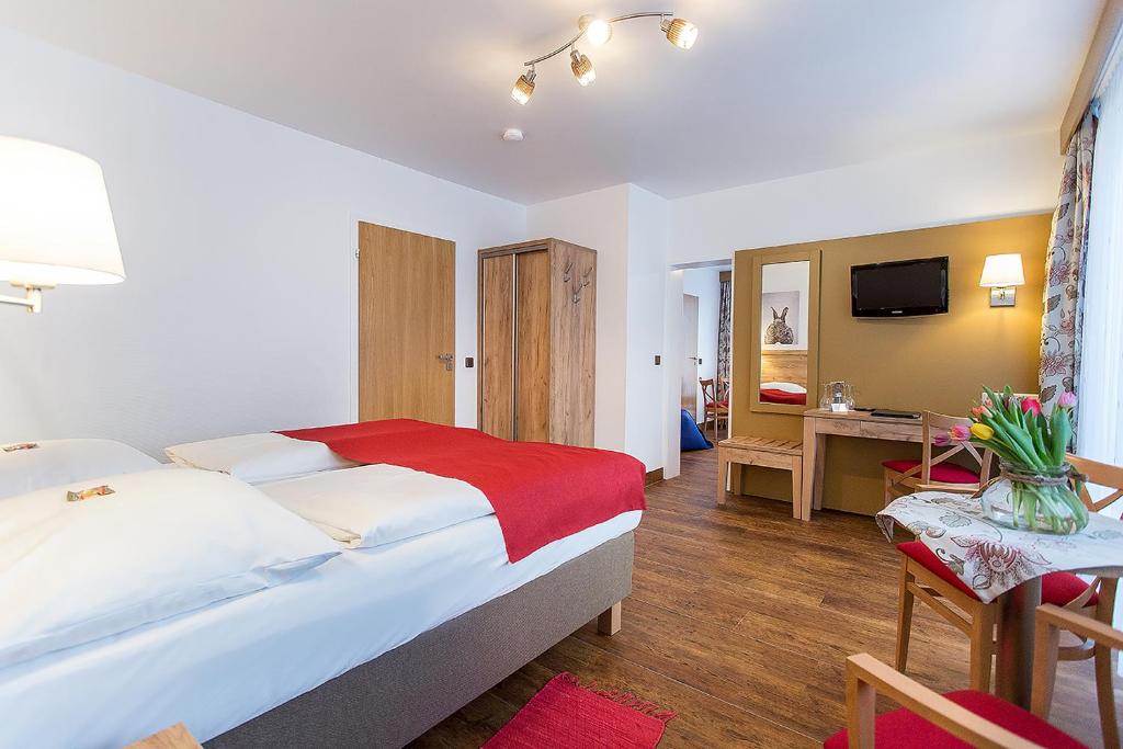 Postel nebo postele na pokoji v ubytování Hotel Diana