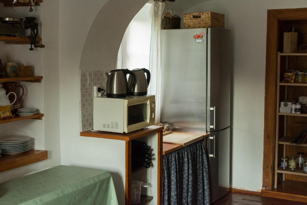Kuchyň nebo kuchyňský kout v ubytování Holiday Home Usedlost Nový Svět