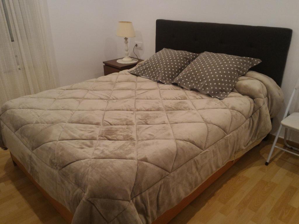A bed or beds in a room at Centre Empuriabrava plage