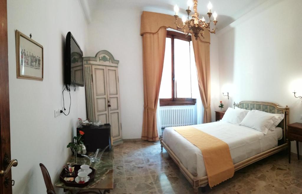 Postel nebo postele na pokoji v ubytování b&b Florence Cathedral