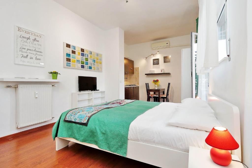 Llit o llits en una habitació de Holiday rental St Peter's area