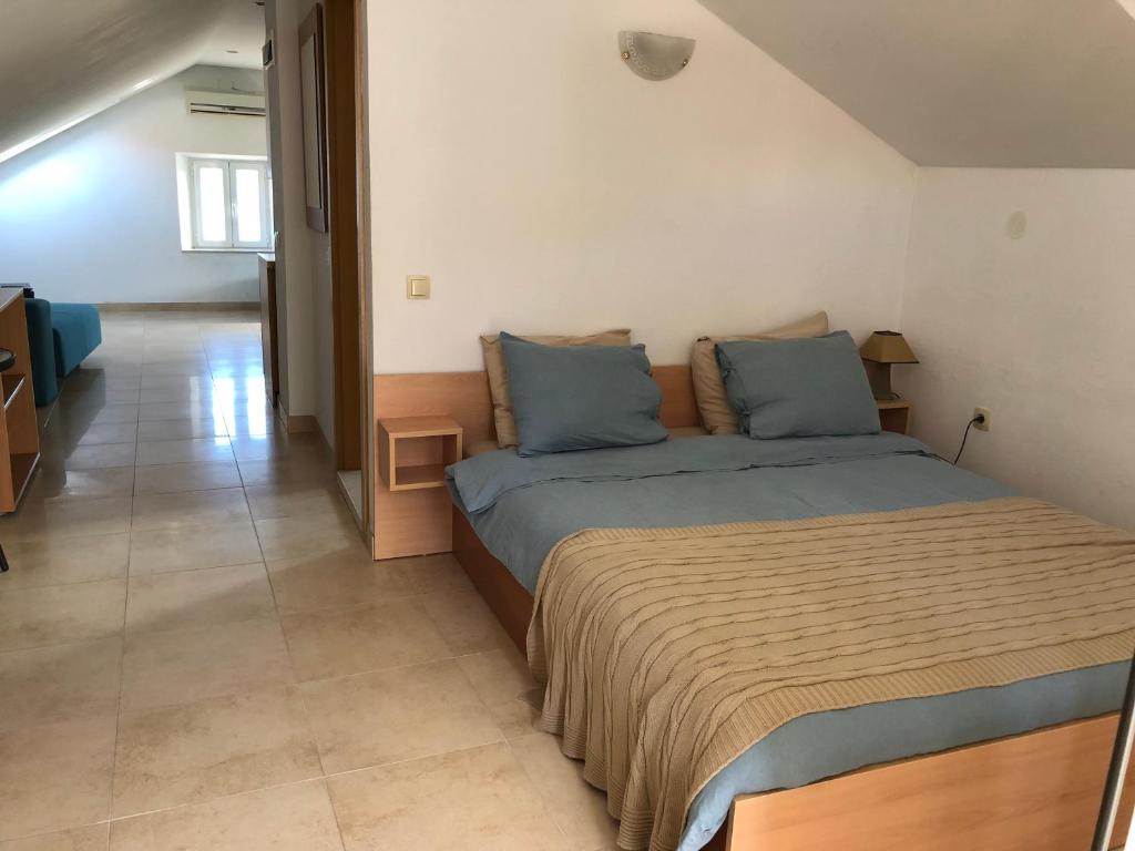 Кровать или кровати в номере Guest House Dijana