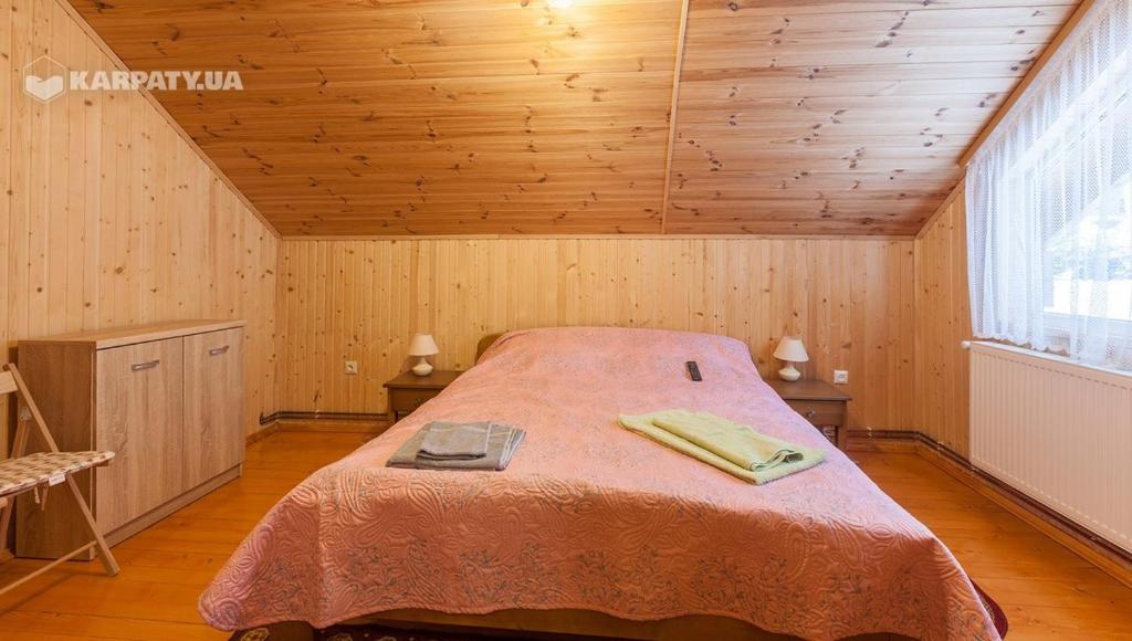 Postel nebo postele na pokoji v ubytování У Гриніва