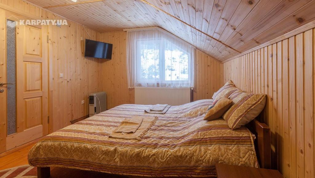 Postel nebo postele na pokoji v ubytování У Гриніва