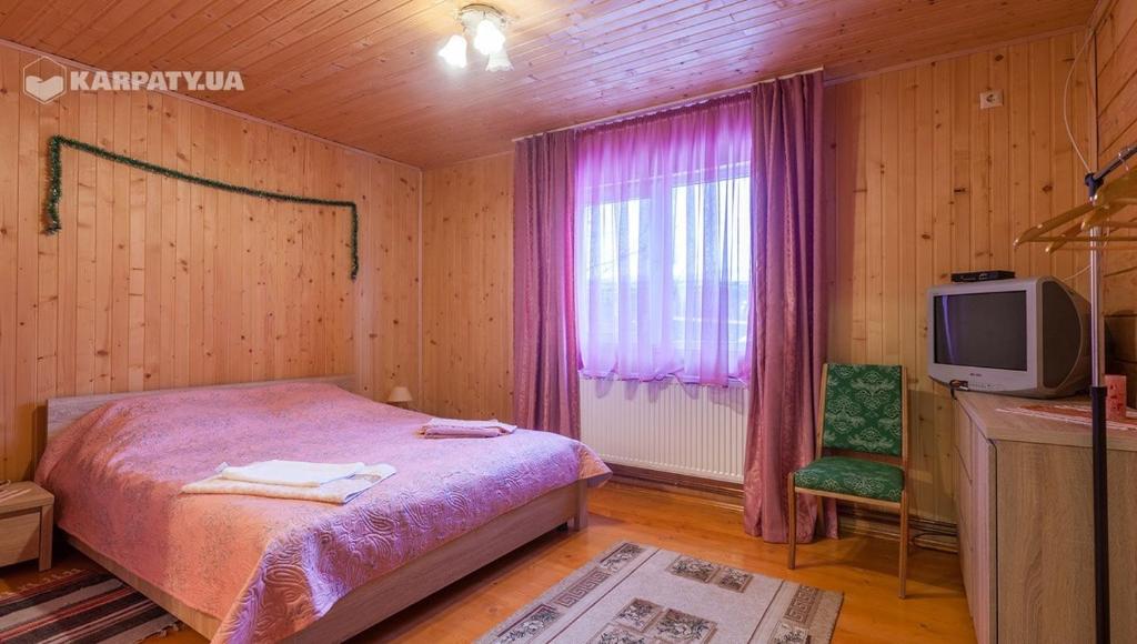 Postel nebo postele na pokoji v ubytování У Гриніва
