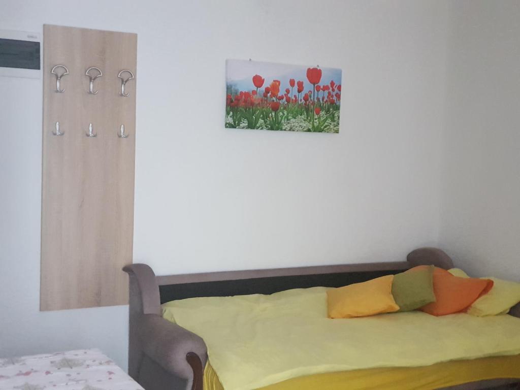 Postel nebo postele na pokoji v ubytování Apartments Popovic