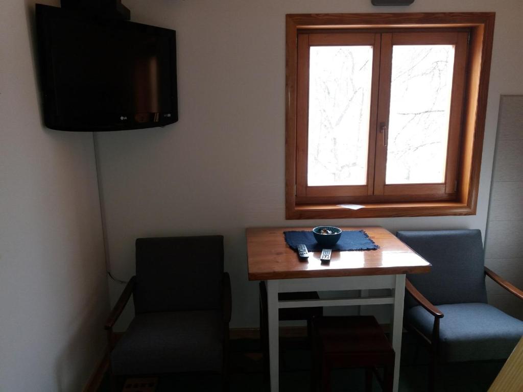Televiisor ja/või meelelahutuskeskus majutusasutuses Vacation Home Nana
