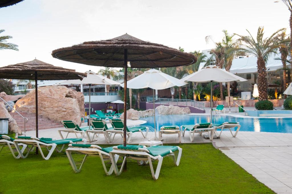 Bazén v ubytování Leonardo Club Eilat - All Inclusive nebo v jeho okolí