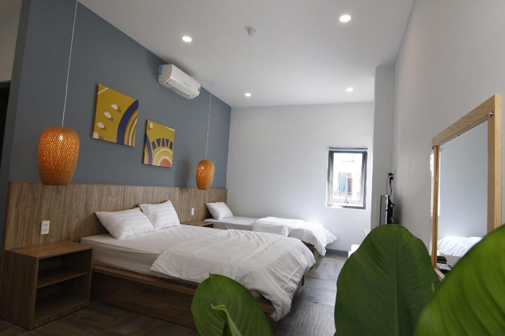 Postel nebo postele na pokoji v ubytování 5 Elements Hotel