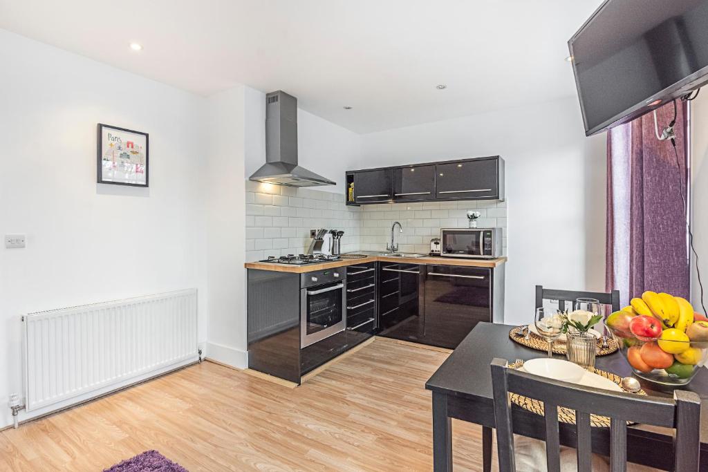 Kuchyň nebo kuchyňský kout v ubytování Knightsbridge Dream Apartment