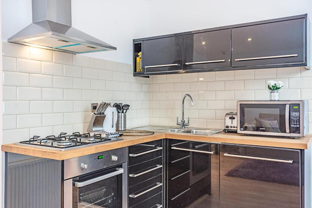 Kuchyň nebo kuchyňský kout v ubytování Knightsbridge Dream Apartment