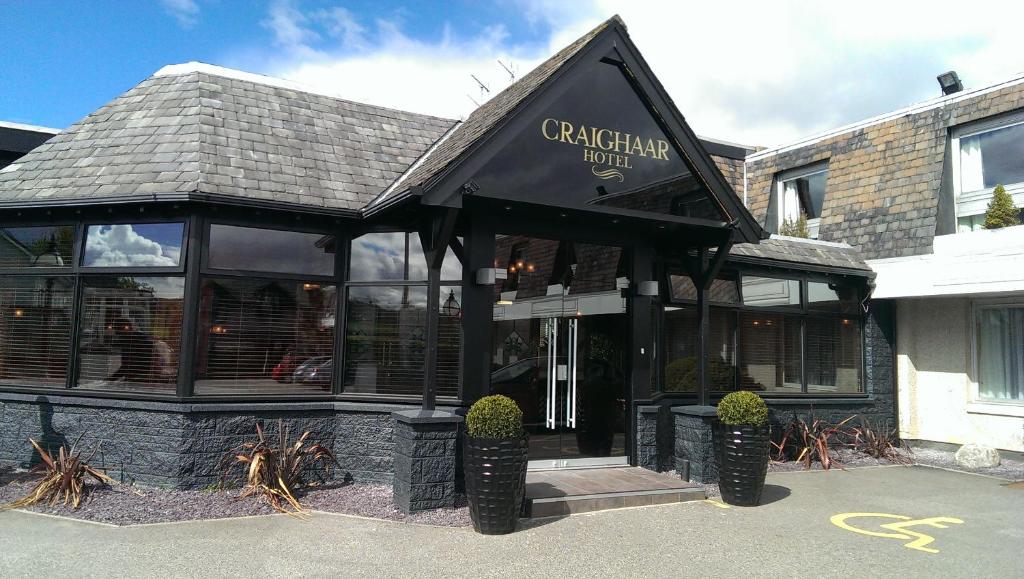 a restaurant with a sign on the front of it at The Craighaar Hotel in Aberdeen