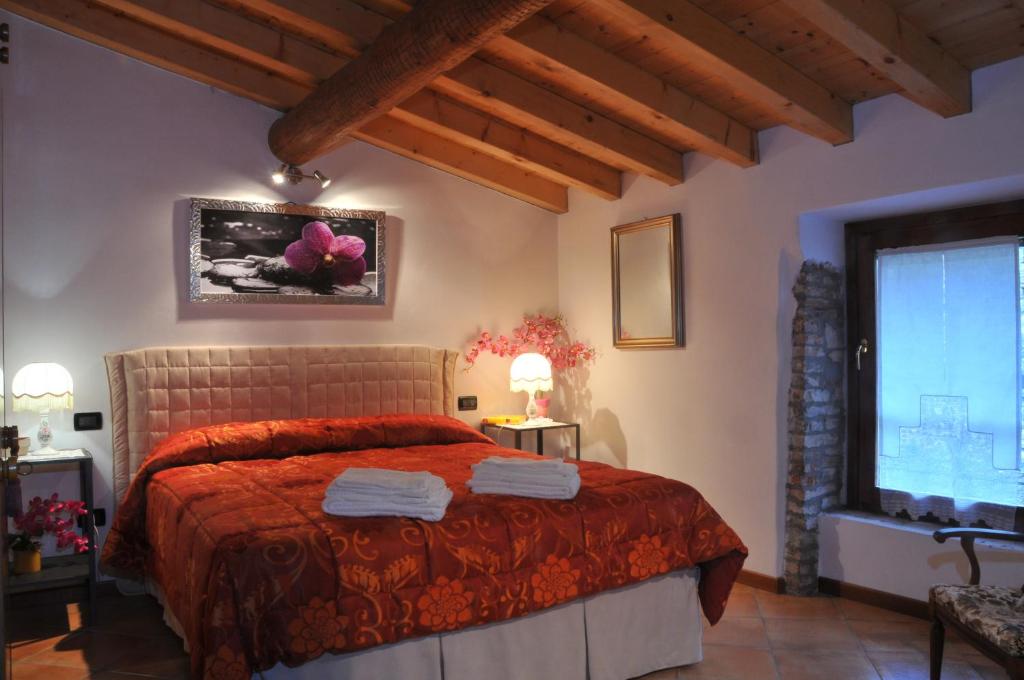 Bed & Breakfast Castello tesisinde bir odada yatak veya yataklar