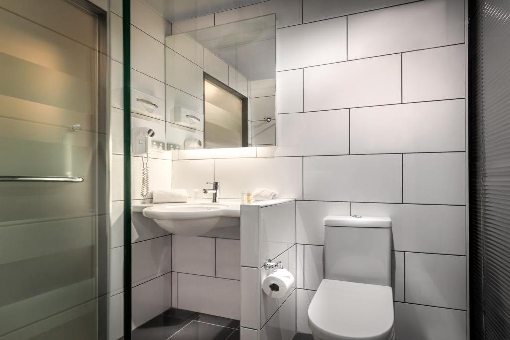 Koupelna v ubytování Essence Hotel Carlton