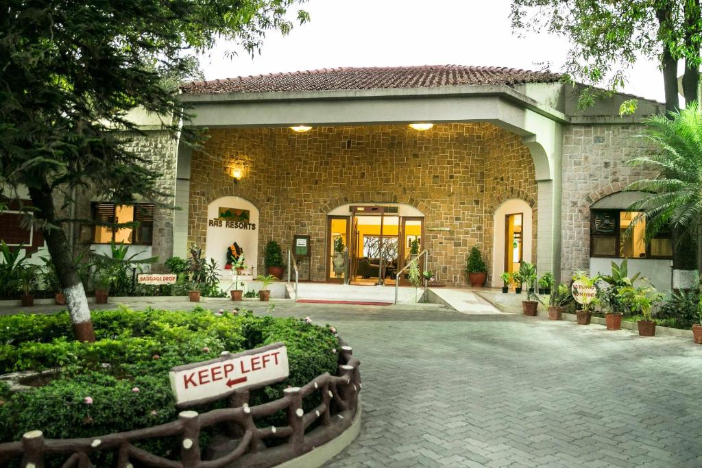 a building with akeep left sign in front of it at Ras by Treat Resorts, Silvassa - in Silvassa