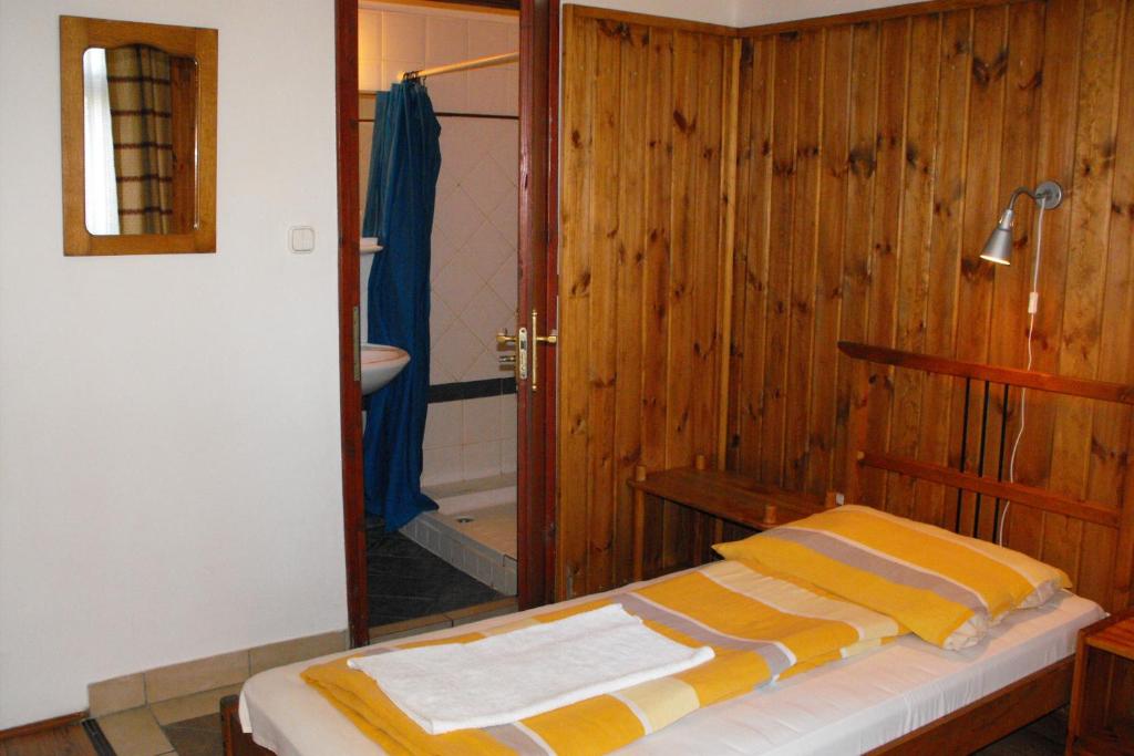 Postel nebo postele na pokoji v ubytování Hungaria Guesthouse