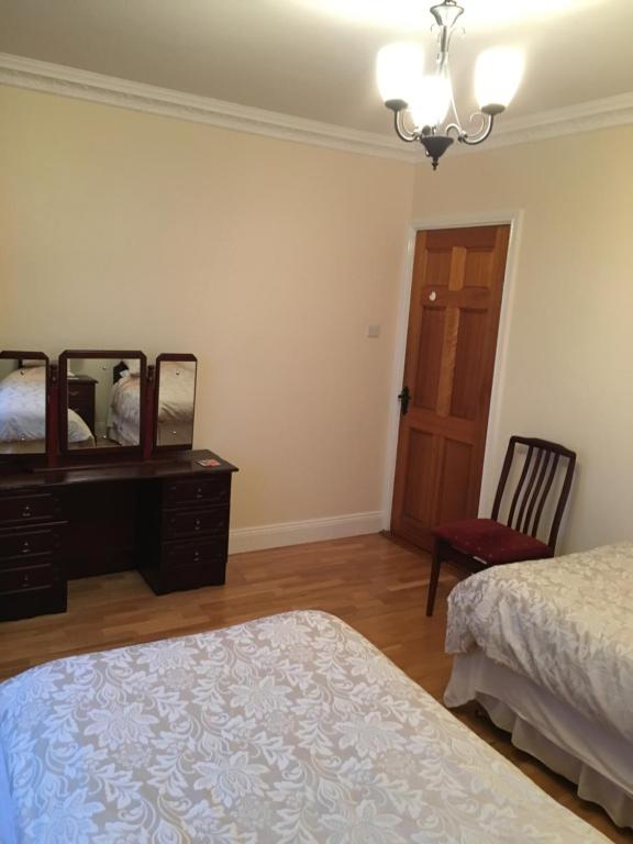 Letto o letti in una camera di Oakdale, Templemore, E41F856