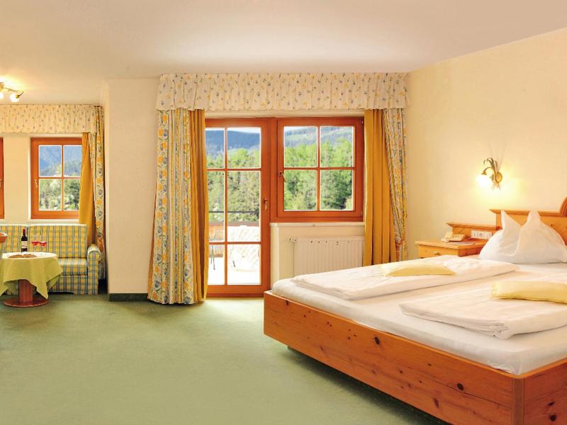 Postel nebo postele na pokoji v ubytování Hotel Flötscherhof