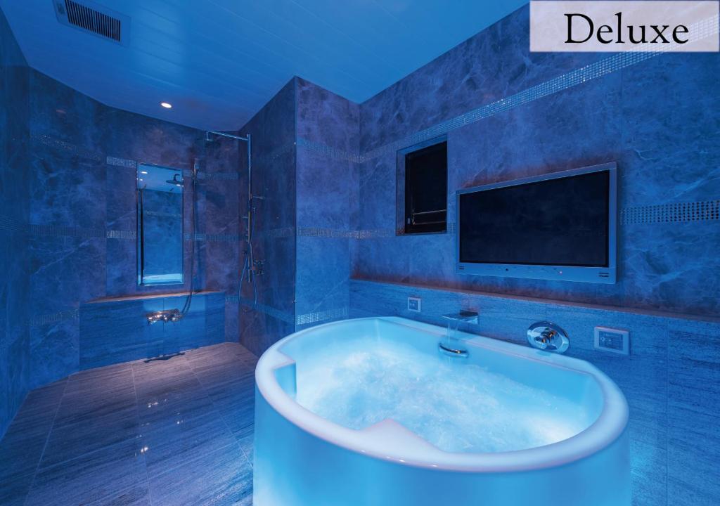 TV a/nebo společenská místnost v ubytování Hotel New York (Adult Only)