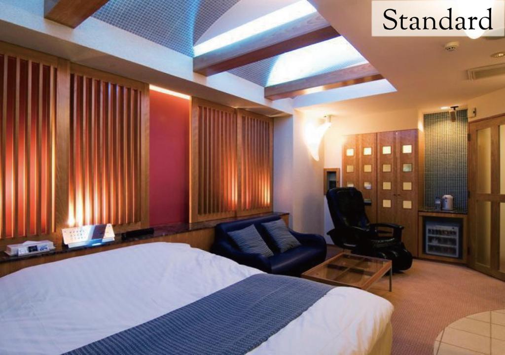 Postel nebo postele na pokoji v ubytování Hotel New York (Adult Only)