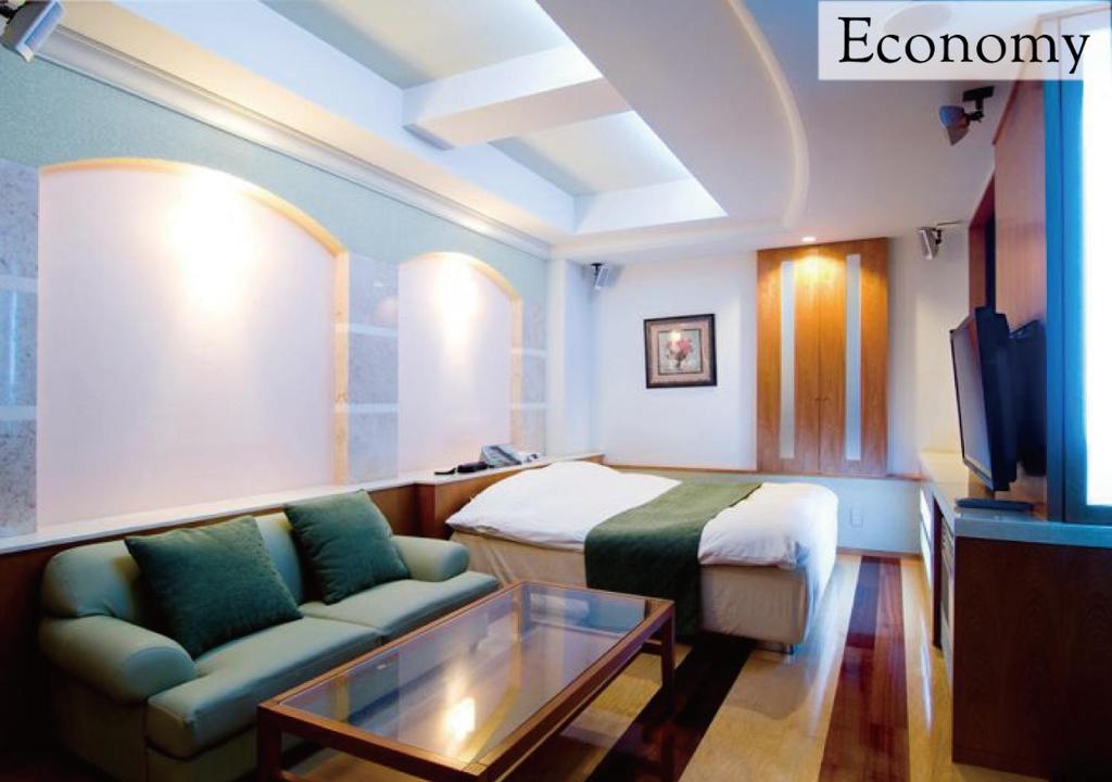 Postel nebo postele na pokoji v ubytování Hotel New York (Adult Only)